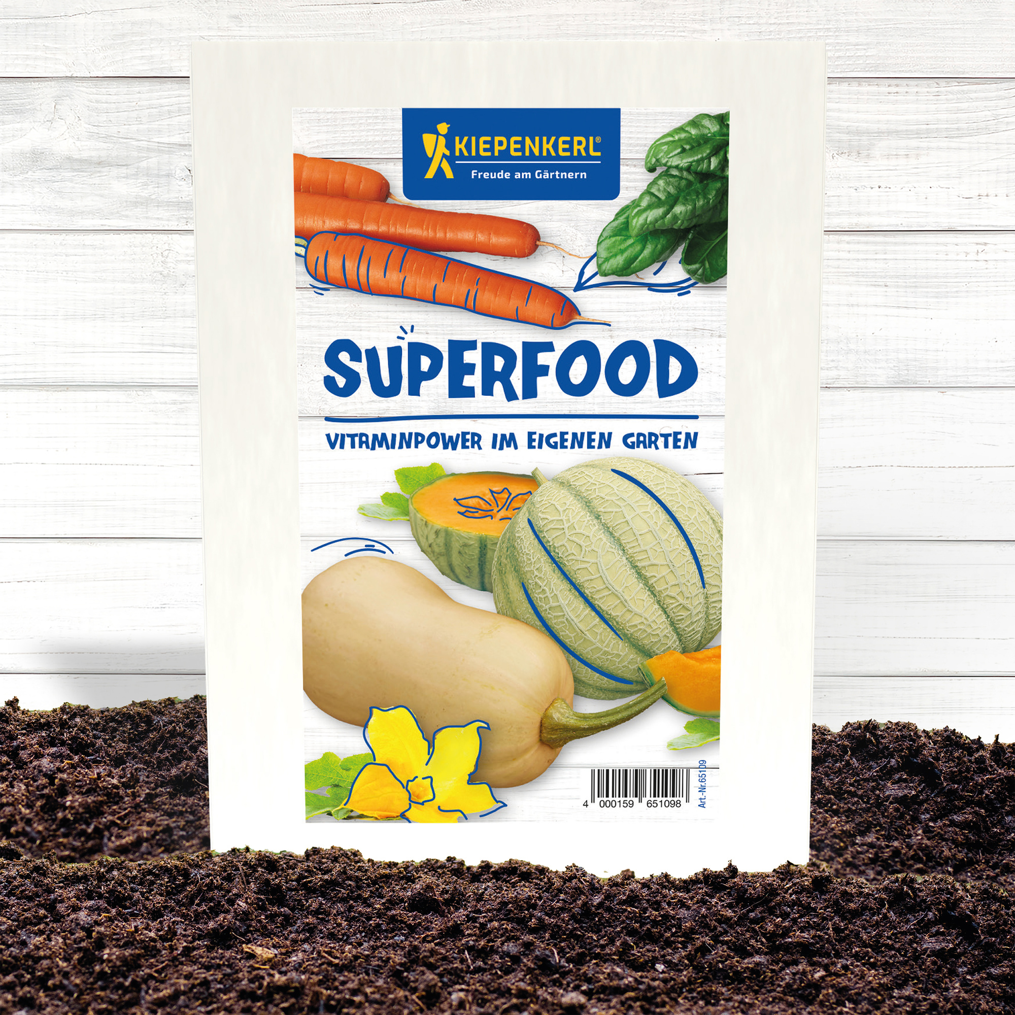 Samen Gemüse auf weißem Holzuntergrund gepflanzt, Paket mit Superfood-Logo und bunten Gemüsesorten.