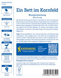Verpackungsbeschreibung für Blumensamenmischung Ein Bett im Kornfeld mit Text, Logo und QR-Code, bunte Gestaltung.