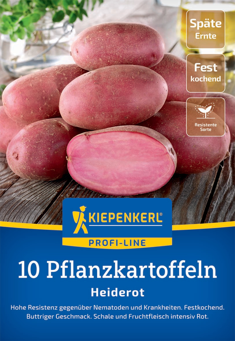 Haufen roter Kartoffeln, eine halbierte ist sichtbar, auf Holzuntergrund, Verpackung mit Kiepenkerl Logo, Kartoffeln label.