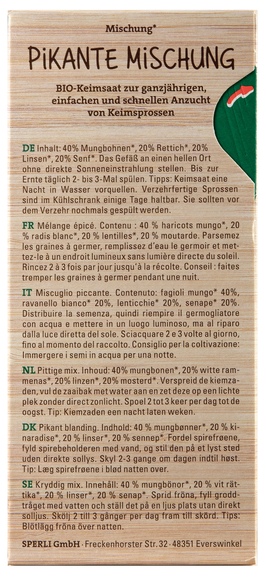 Samen von keimfreiem Saatgut, beigelegt in einer Kartonpackung mit grüner Ecke und rotem Pfeil.