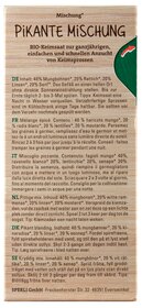 Samen von keimfreiem Saatgut, beigelegt in einer Kartonpackung mit grüner Ecke und rotem Pfeil.