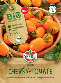 Orange Cherry-Tomatoes in einer Holschale mit grünen Blättern, Etikett mit Produktinformationen.